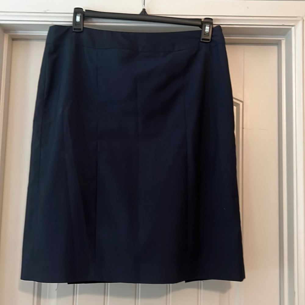 Jones Wear Navy Pencil Skirt with side zipping and stylish back slit.